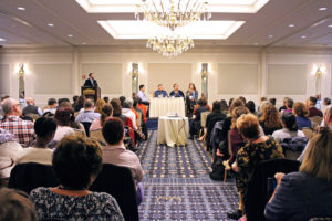 Photo of speakers and audience at 2017 Advancing Excellence in Transgender Health Conference