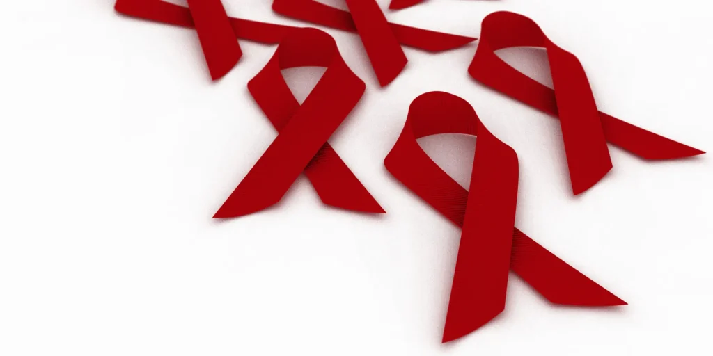 Red Ribbons on white surface